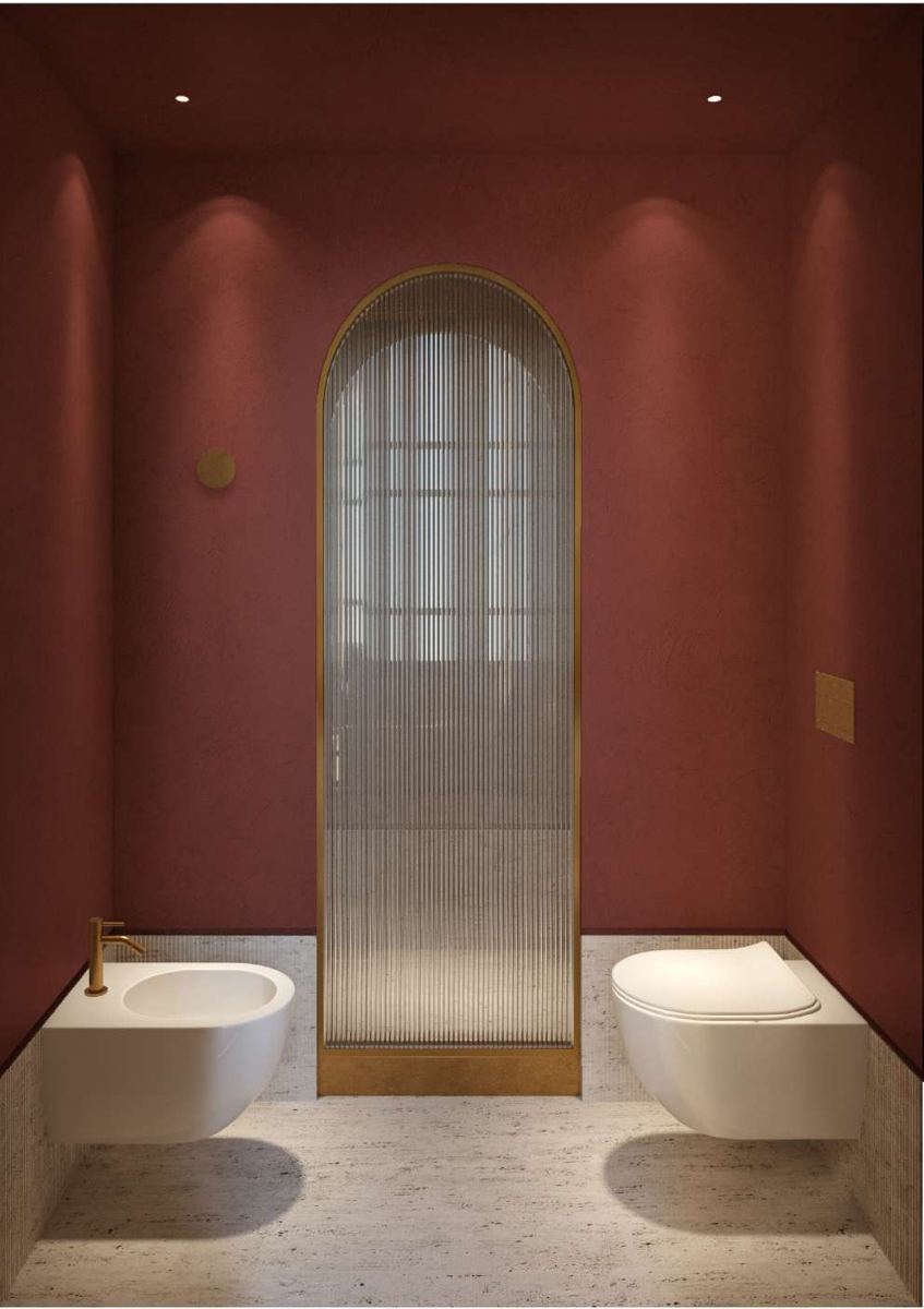 Render di un bagno con parete color terracotta